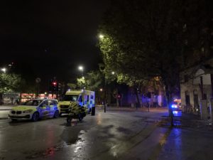 Police and Ambulance parked up outside accommodation in London, after an alleged violent break in. 