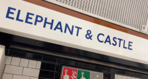Underground sign of Elephant & Castle tube station. Reads "Elephant & Castle" in blue capital letters