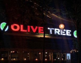 "Olive Tree" sign outside restaurant